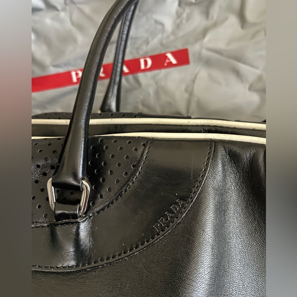 Rare vintage PRADA 'Vitello Drive' Black Leather Bowling Bag modeled by Gisele - Picture 13 of 16